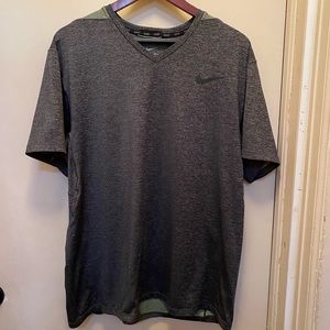 NWOT Nike Dri-Fit sized XL multi green and black athletic shirt. Black swoosh